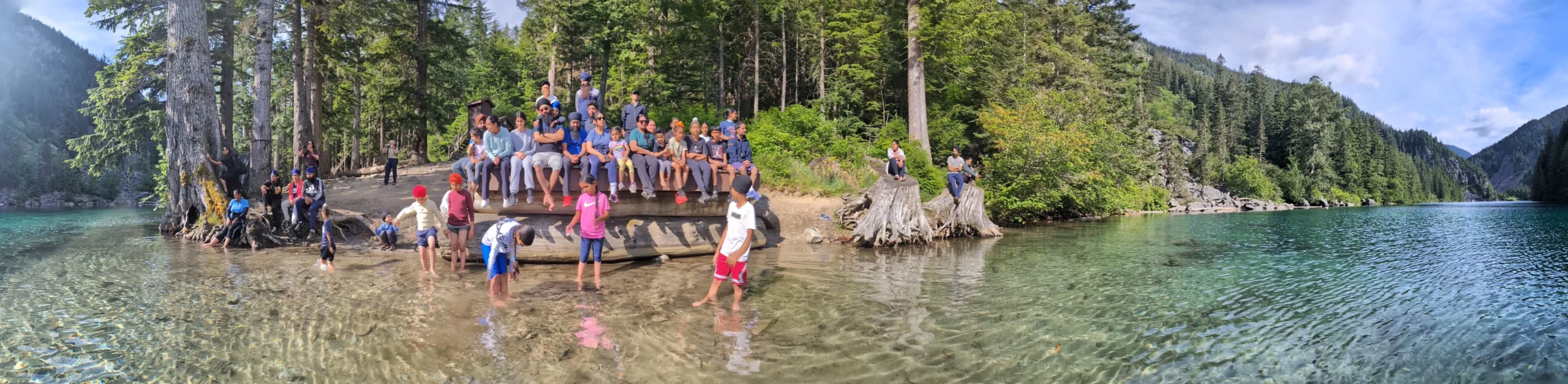 Team hiking in scenic British Columbia mountains